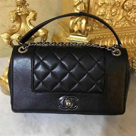 vintage chanel mademoiselle black bag|More.